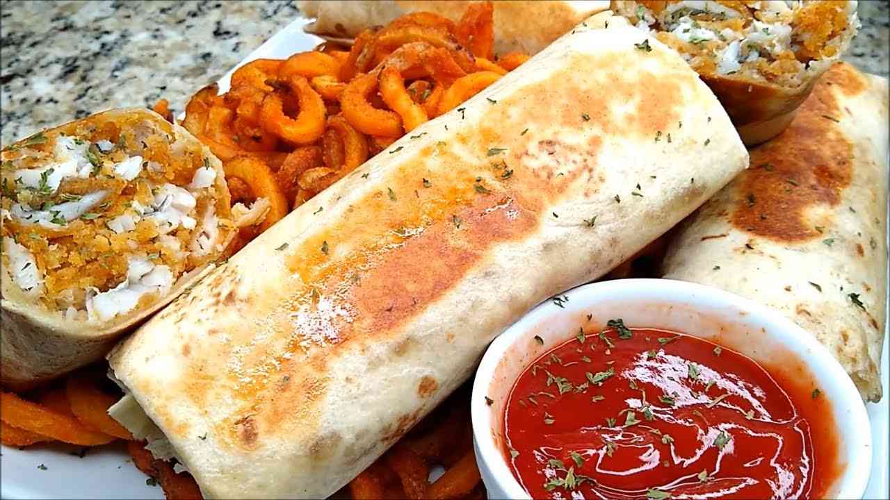 Baja-Style Fish Burrito with Beer-Battered Cod, Slaw & Chipotle Crema